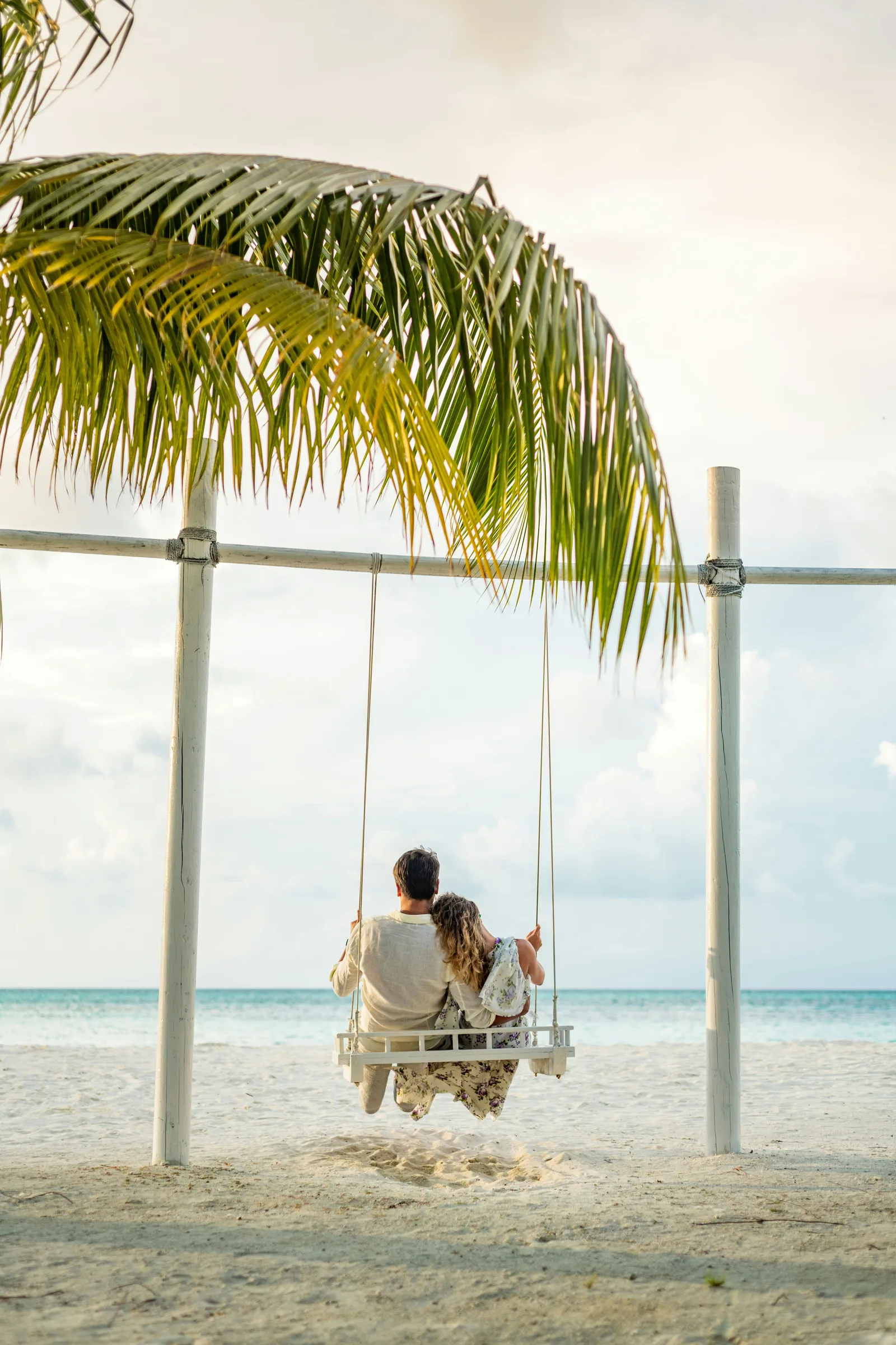 Couple enjoying serene beachfront walks in Sri Lanka